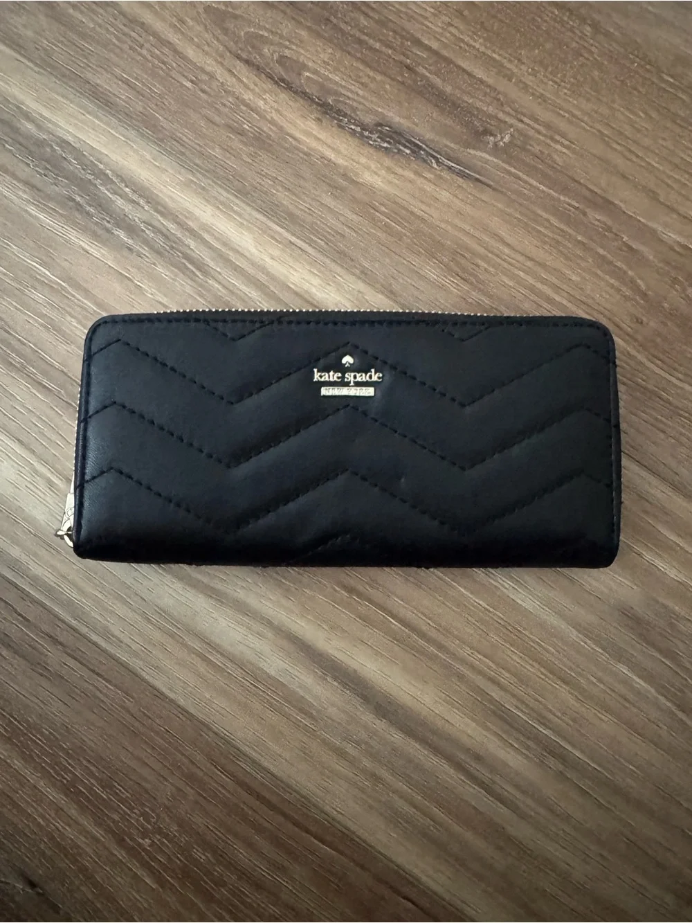 kate spade Black Quilted Chevron Zip-Around Wallet with Gold Logo